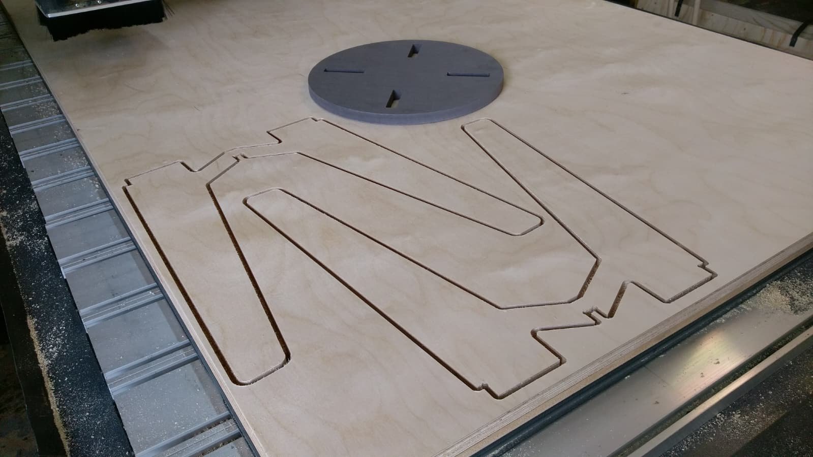 CNC routed architectural lattice panels in MDF, laid out across the Rule One CNC workshop floor in Walthamstow