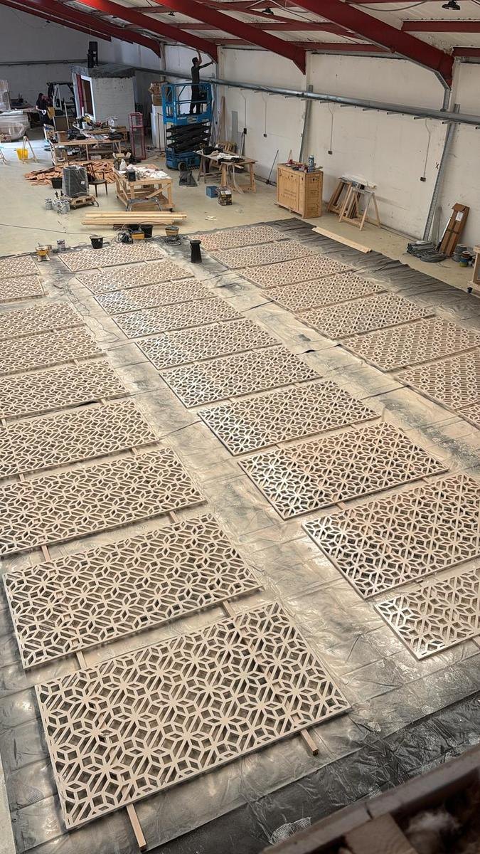 CNC cut MDF structural arch frames with internal ribbing, fabricated by Rule One CNC