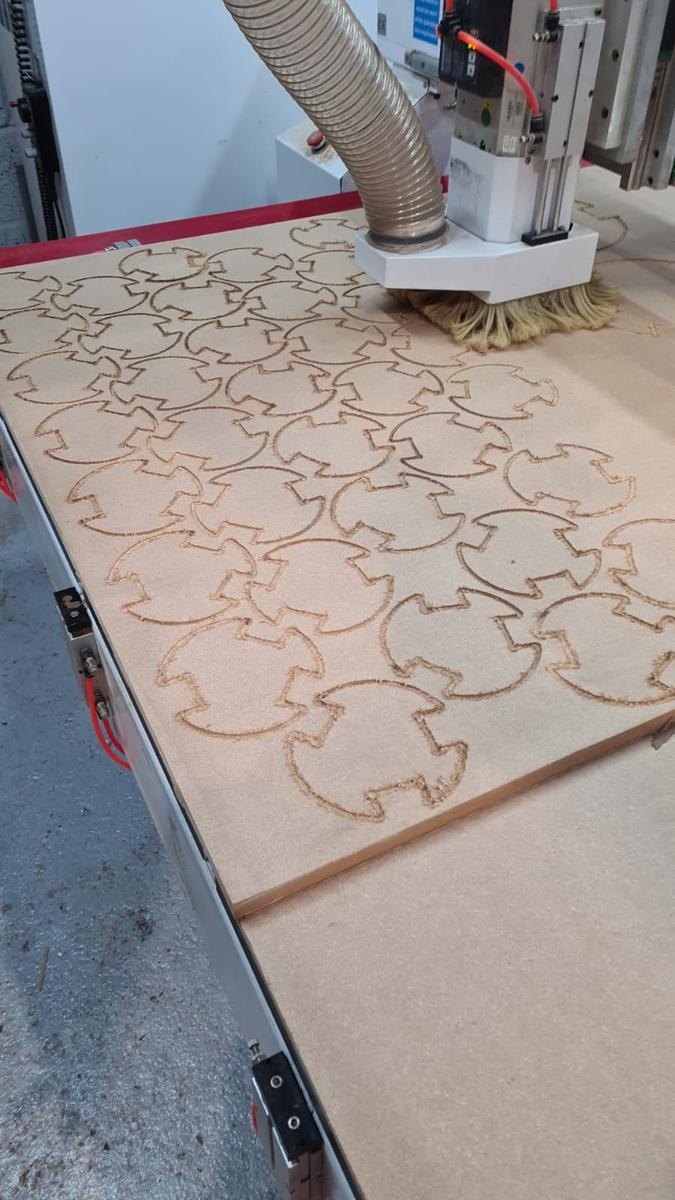 Close detail of a single CNC routed decorative lattice panel in MDF showing cut precision
