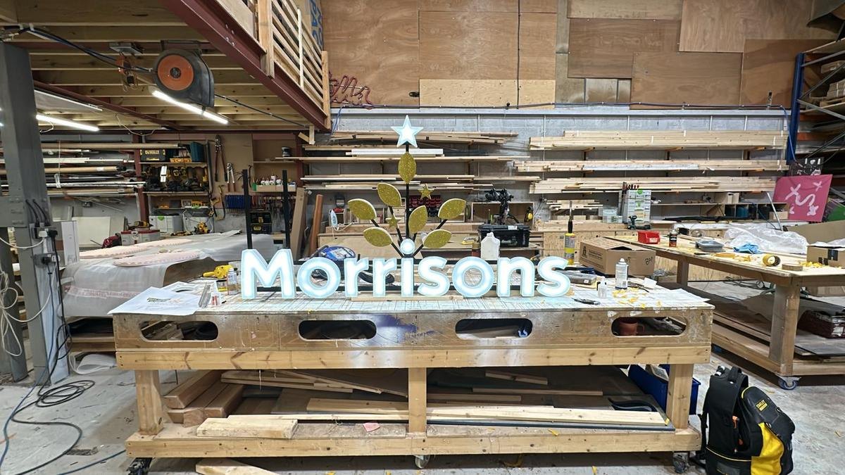 CNC cut Morrisons illuminated retail signage lettering, machined at the Rule One CNC workshop